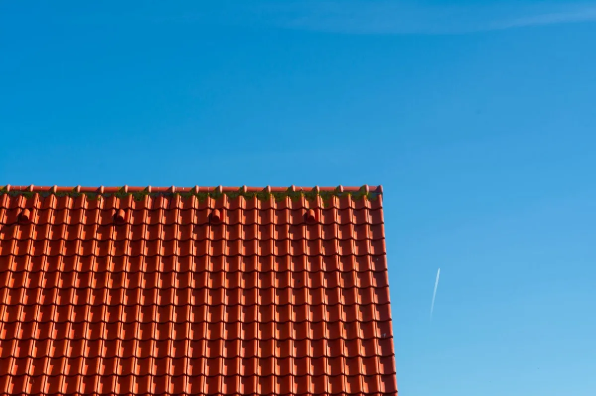 Tile roof gable in full sun, the kind of exposure that sets roof life in Burleson, TX